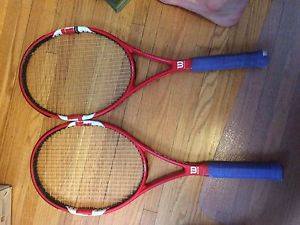 Two 4 1/2 Wilson Six.One Team rackets.