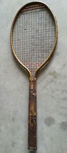 Antique tennis racquet all metal including handle