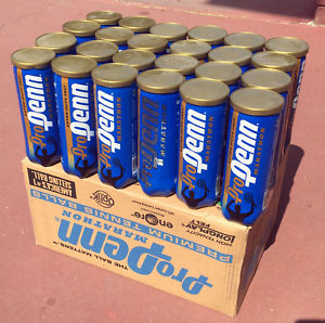 BOX OF 24 EMPTY CANS OF TENNIS BALLS WITH LIDS AND ORIGINAL BOX