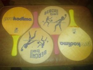 Set of 4 Vintage 1970's Prokadima. 2 Yellow and 2 Red Handle Paddleball Paddles