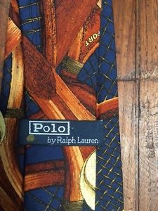 VINTAGE POLO TIE FEATURING TENNIS RACQUETS AND TENNIS BALLS
