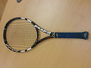 BABOLAT PURE DRIVE , USED, 26IN ,HEAD SIZE 100 SQ.IN.,GRIP 4