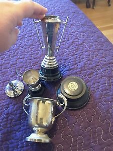 Lot of three silver plated sports, tennis trophy cups