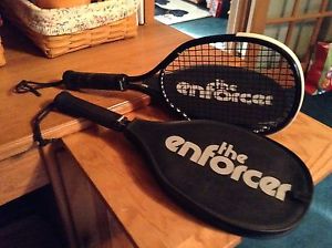 set of two racquetball rackets with the leather cover