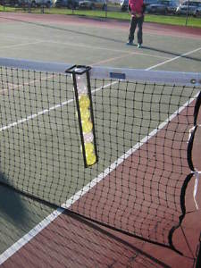 pickleball ball holder custom built metal strong & sturdy mounts on tennis net