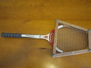 Vintage MacGregor Challenger tennis racket with a press