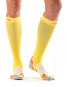 Skins Essentials De mujer compression calcetines limoncello/pomelo ZB99589339212