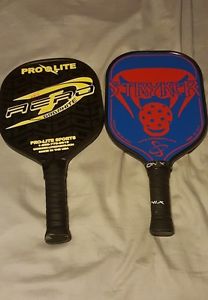 pickleball paddles 1) pro-lite graphite, 1) oinx Stryker used/demo