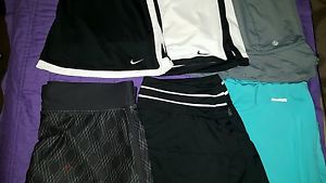 Lot of women's Nike dry fit, Reebok, and Lija tennis skorts. Size Large.