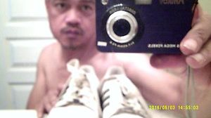 Men's white Adidas tennis shoes size 9, leather